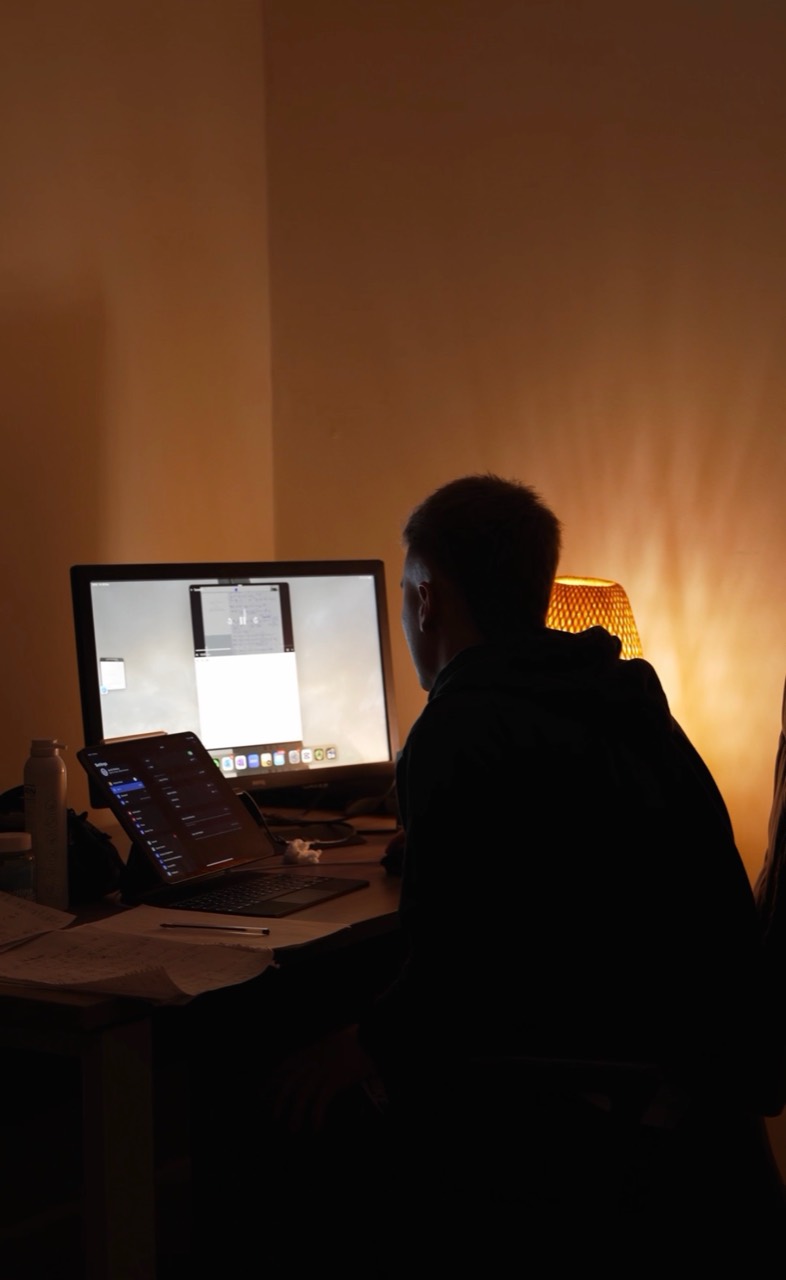 Jacob Mackey working at a desk